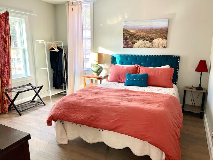 The second bedroom is quite large, and also features 100% cotton and linen bedding. There is a desk and a pack-n-play in this room too.