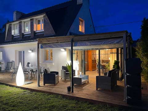 House near beach and village