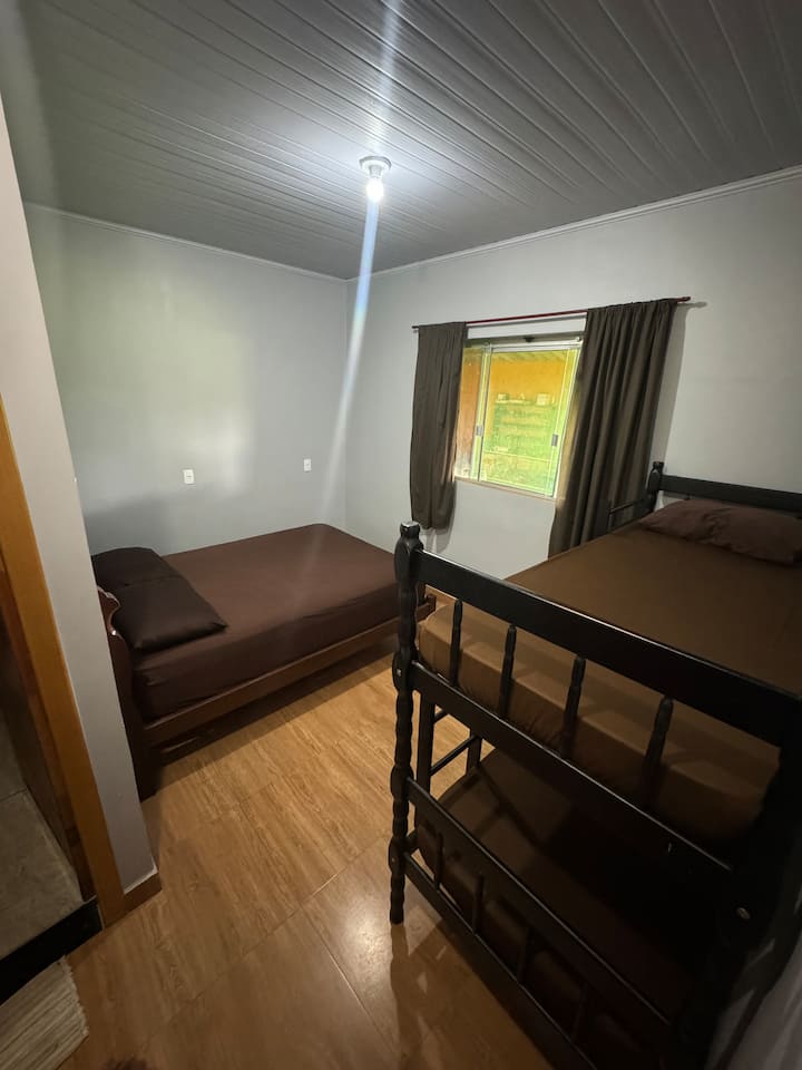 Suite 2: Comfortable bed and privacy.