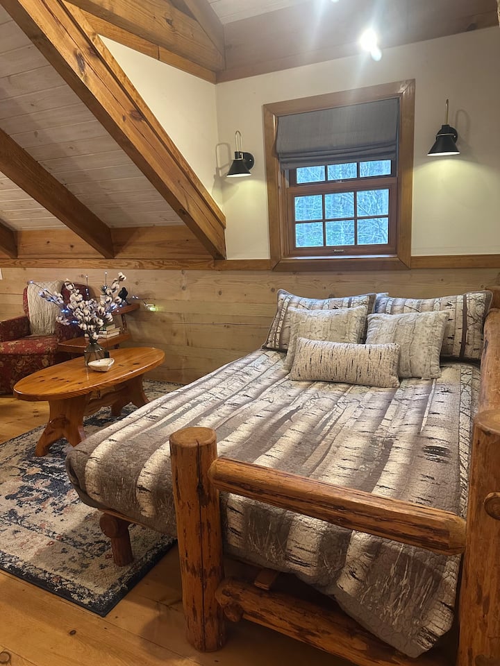 Double bed located in loft