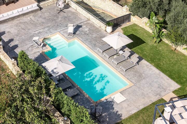 Villa Aris: A Serene Escape with 3 BRs, Pool & BBQ
