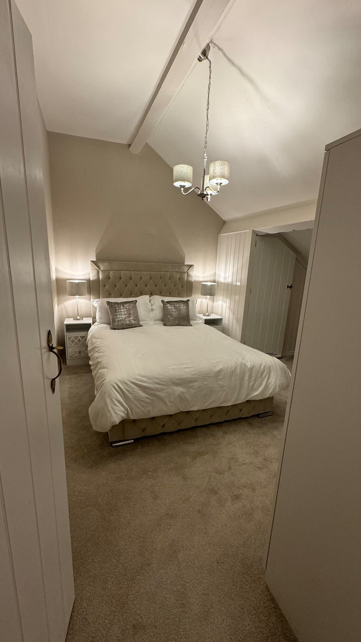 Luxurious king size bedroom with separate bath , toilet and sink