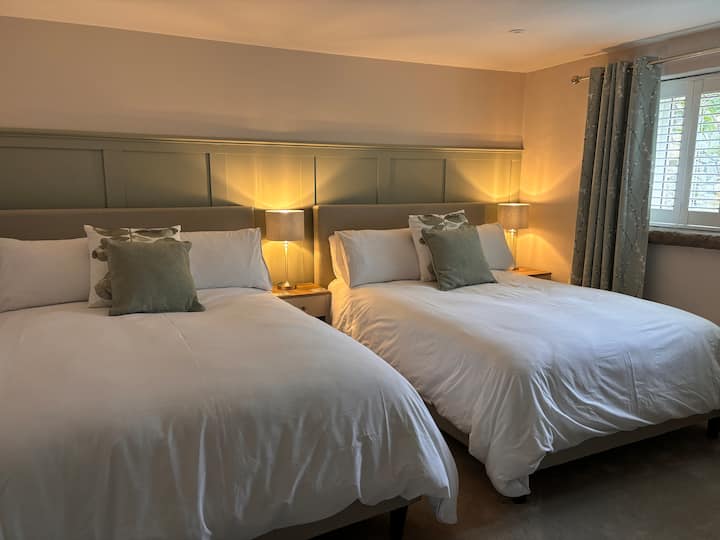 Dowstairs family bedroom with ensuite shower room