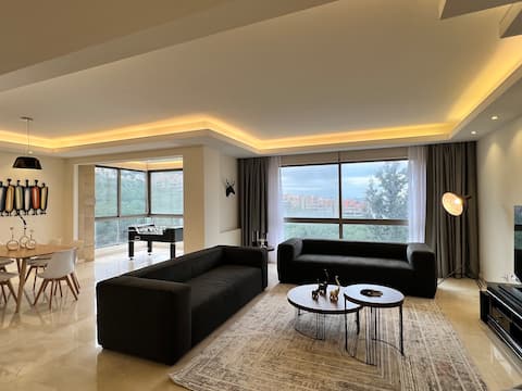 Minimalist apt with panoramic view, Sahel Aalma