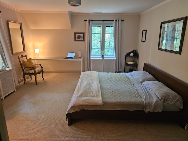 Bedroom with King-Sized Platform Bed - 2x Chairs and Large Desk