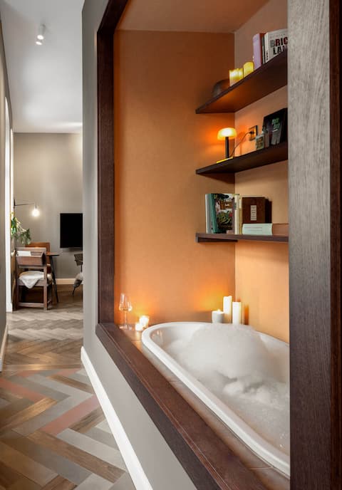 Wellness oasis with bathtub, balcony and sauna