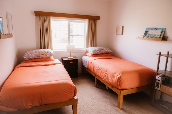 Two single beds comfortable for both kids & big kids. 
