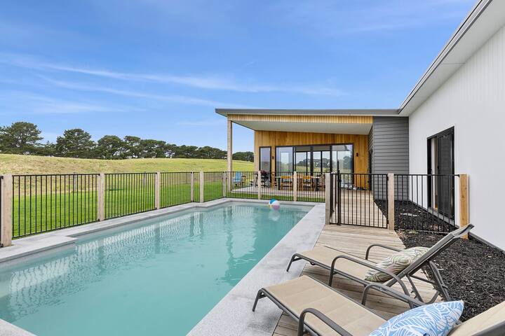 Designer Coastal Home with pool gallery image 2