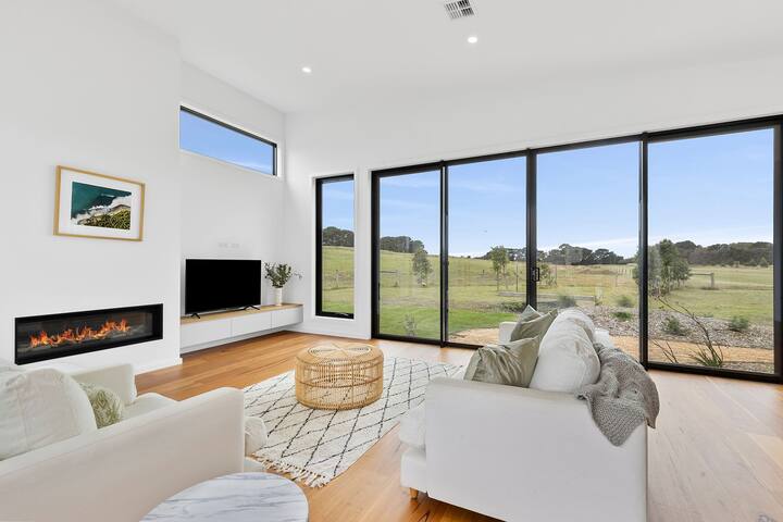 Designer Coastal Home with pool gallery image 3