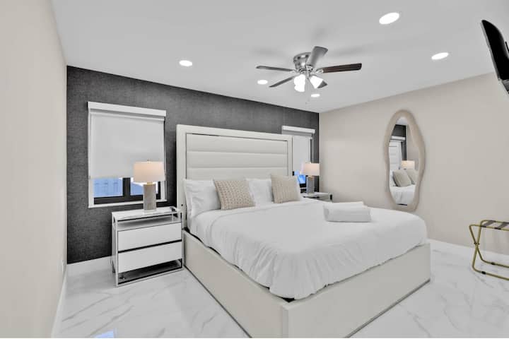 Master bedroom with a private bathroom