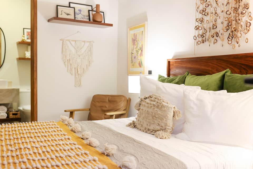 Sink into your bedroom: warm textures, considered details, and exactly the right amount of everything.