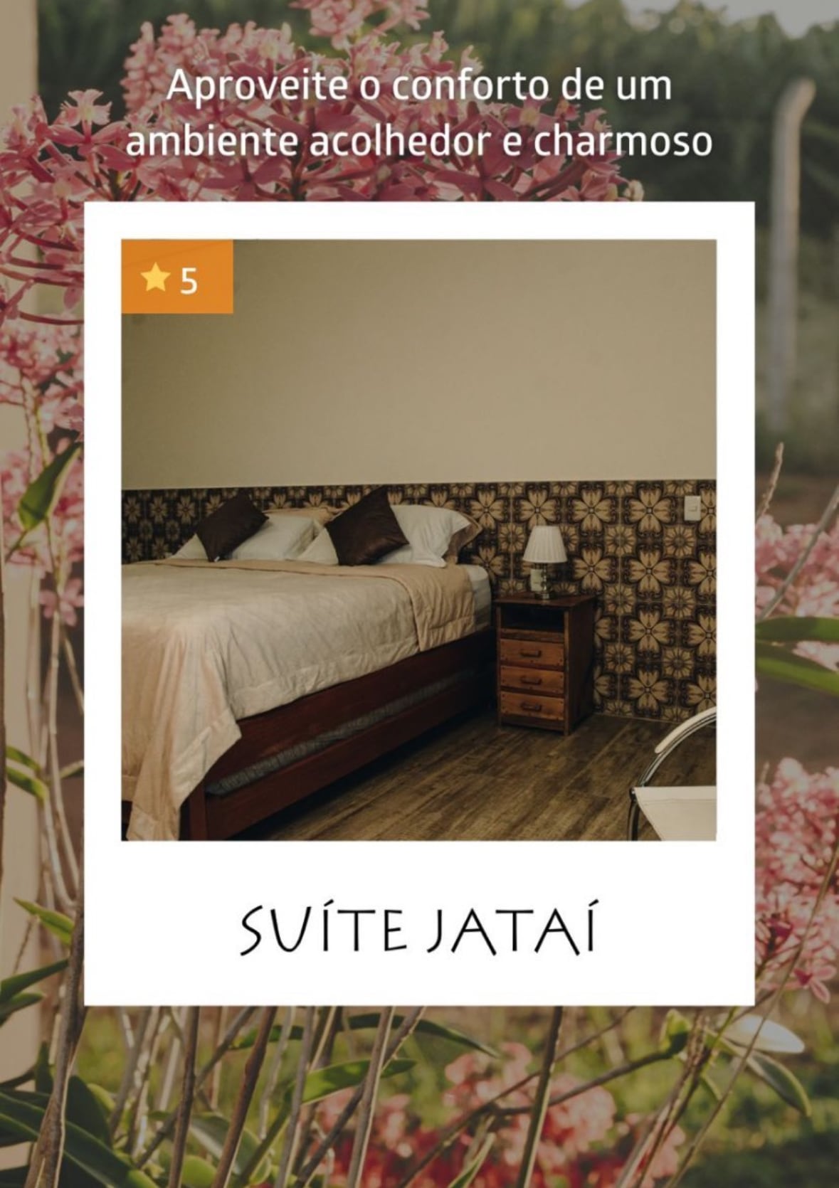 The sleeping area features a spacious bed with a wooden headboard, complemented by patterned wallpaper. A bedside table with a lamp is positioned next to the bed, providing illumination. Natural light enters through a window, enhancing the cozy atmosphere.