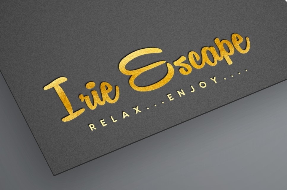 A stylized logo features the words 'Irie Escape' in gold lettering against a dark background. The phrase 'RELAX...ENJOY...' is elegantly incorporated, conveying a sense of tranquility and leisure.