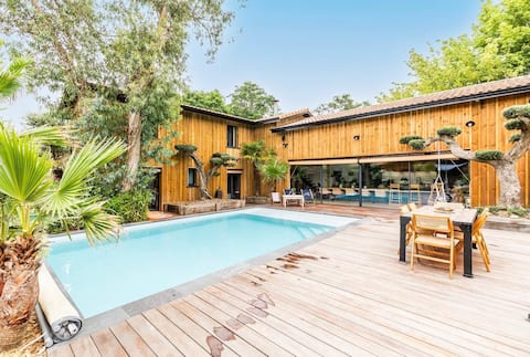 Tropical house in the rainforest near the lake