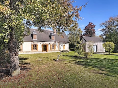 Family home with pool, pond and garden