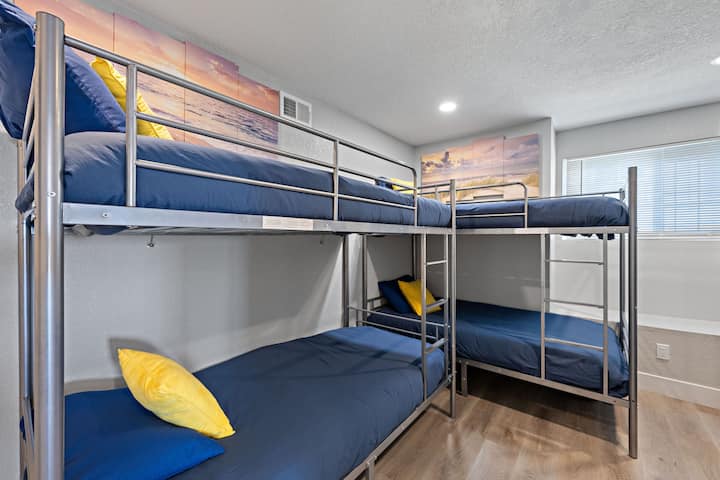 Bunk bed room with 6 twin beds, closet & private TV