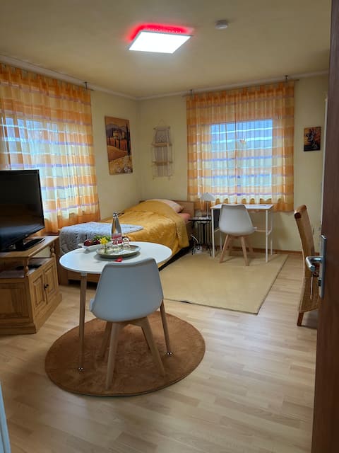 Room
at Gustorf train station,
conveniently located