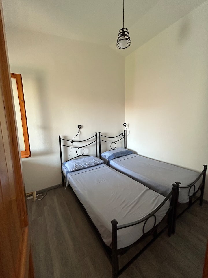 Chambre avec lits simples