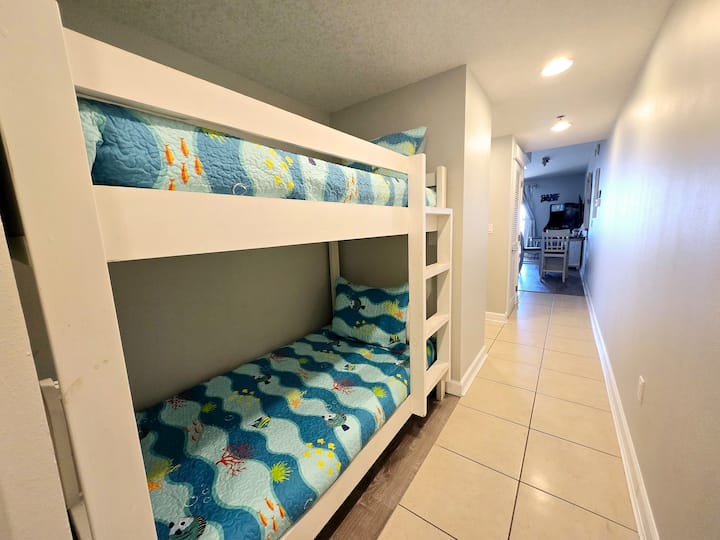 twin bunks in hallway alcove 