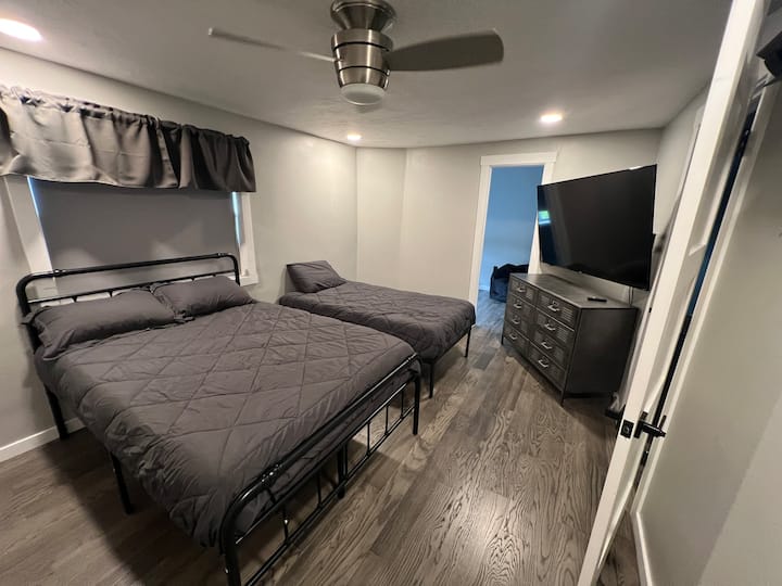 Bedroom 3 offers one double bed and one single bed—a flexible sleeping setup for up to three guests. Review all bedroom photos and the sleeping arrangements to choose the best fit for your group.