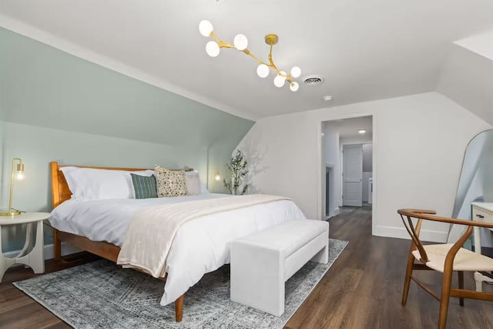 *Upstairs* Oak Canopy Suite (2 bd 1 bath, sleeping 4 + 1 toddler). Bedroom #4 includes king bed, desk, dresser, closet and full length mirror.