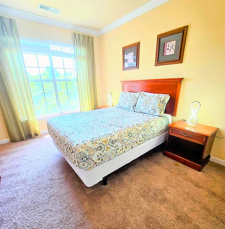 Bedroom with natural view of trees