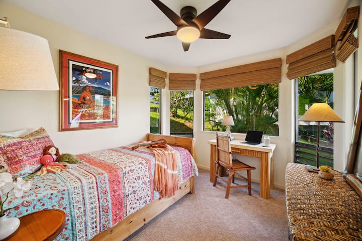 Office/Study serving as third bedroom. Bay louvered windows with pleasant ocean cross breezes. A seven speed ceiling fan and portable A/C. Grass shades as well as solar/blackout shades on east facing windows.