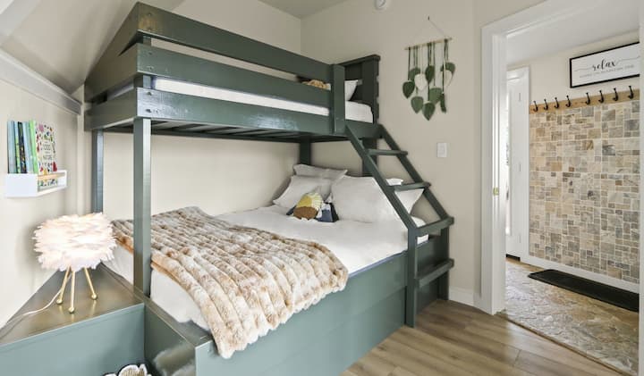 Custom built bunk bed twin XL over queen with memory foam mattresses and Hotel Signature premium cotton sheets. 