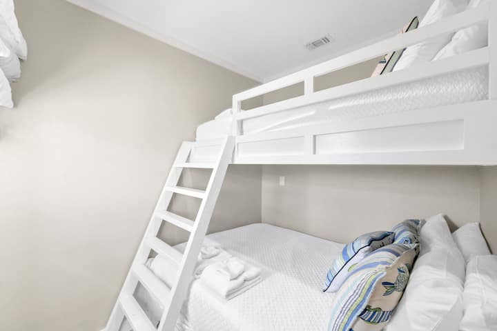 Your kids will love climbing into these crisp white bunk beds, perfect for creating childhood memories and cozy bedtime stories.