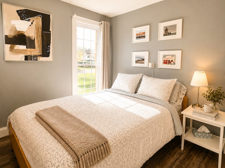 Bedroom 2 - Comfortable queen bedroom designed for restful nights during your Prince Edward County getaway.
