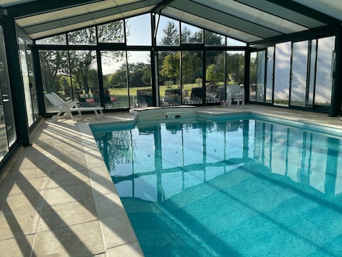 Spacious holiday home with heated and covered pool