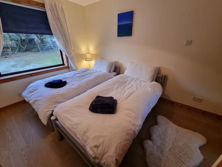 Twee eenpersoonsbedden in bijlage