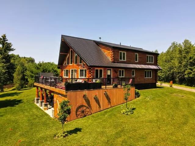 Modern Riverfront Loghome