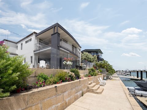 Sunset Waters
Absolute waterfront
Beach house.