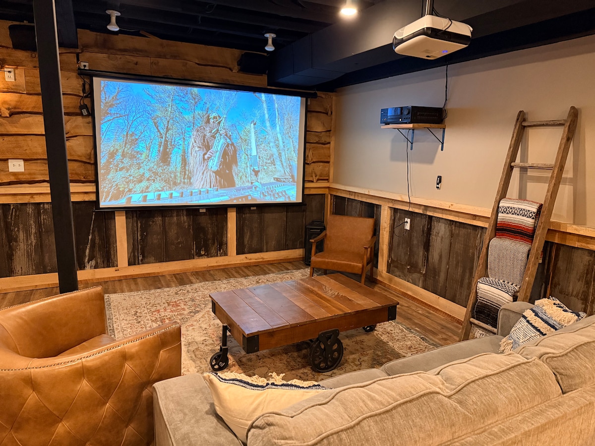 Stream movies with a drop down projector screen. at Sweet River Lodge in Tionesta