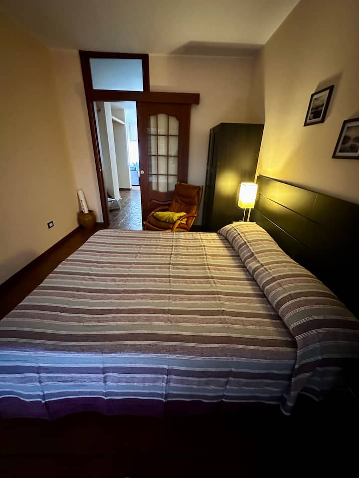 Comfortable queen/full size bed. Bedroom has a balcony. 