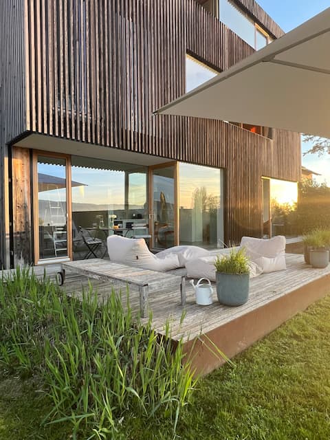 Loft with lake view and garden.