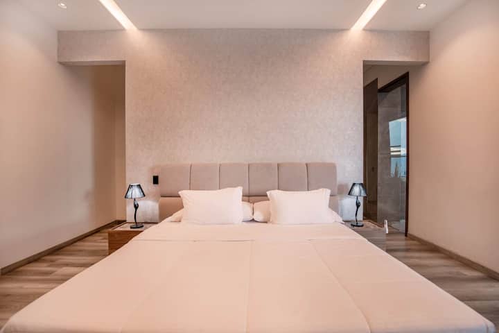 Sleep in style with luxury linens, elegant nightstands, and a calming color palette that sets the tone for pure relaxation and privacy.