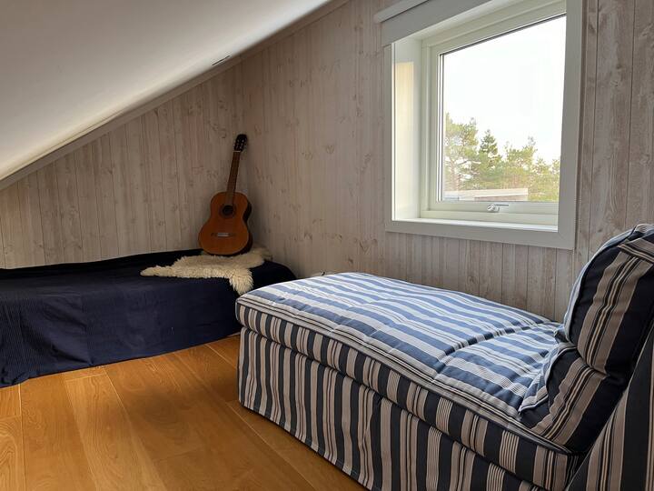 Loft avec matelas double, confortable pour deux adultes