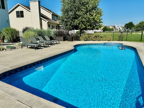Suburban getaway w/heated pool and backyard oasis!
