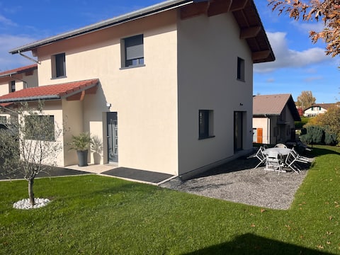 New house between lake and mountain