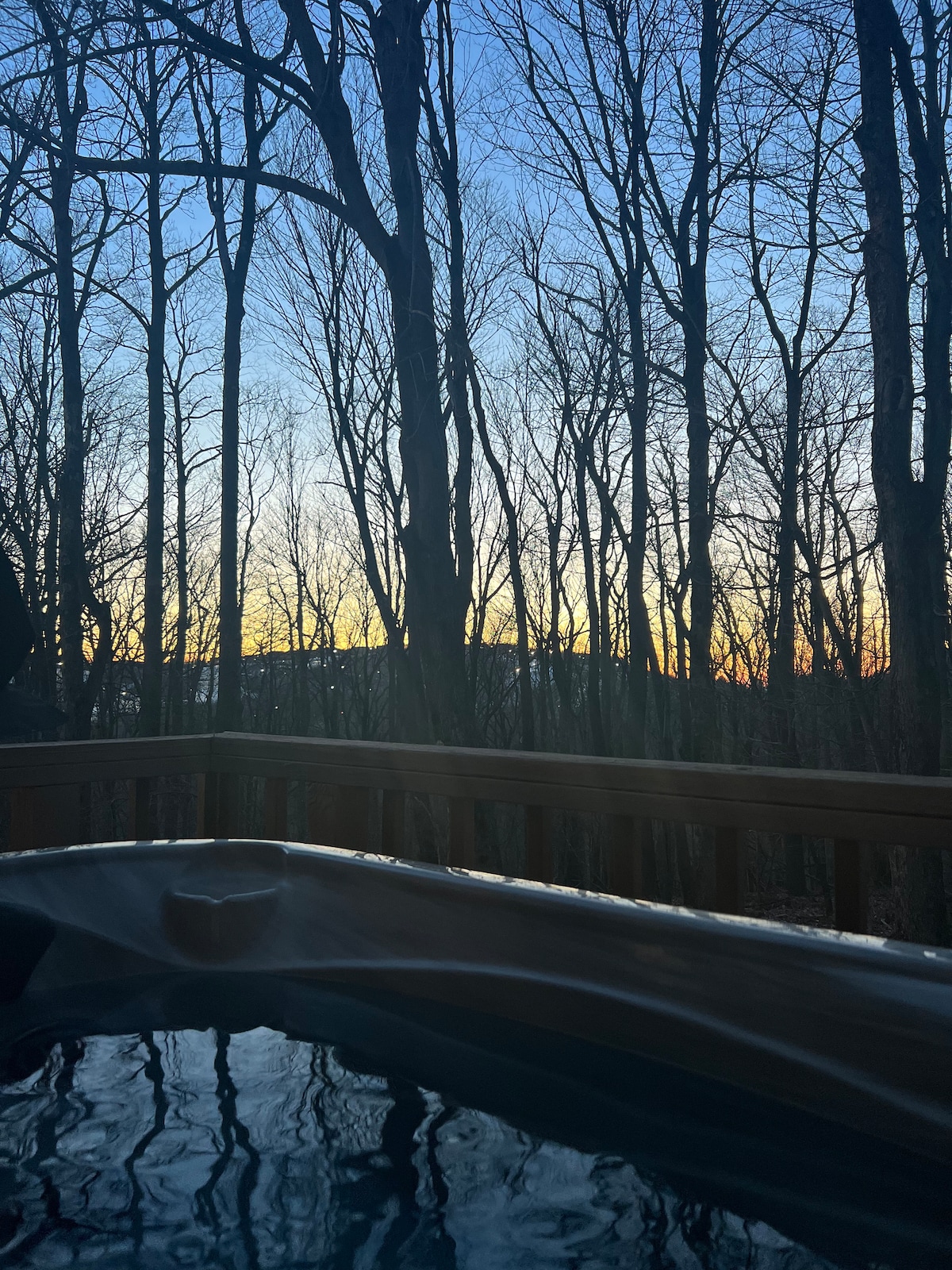 Spacious living area with large TV