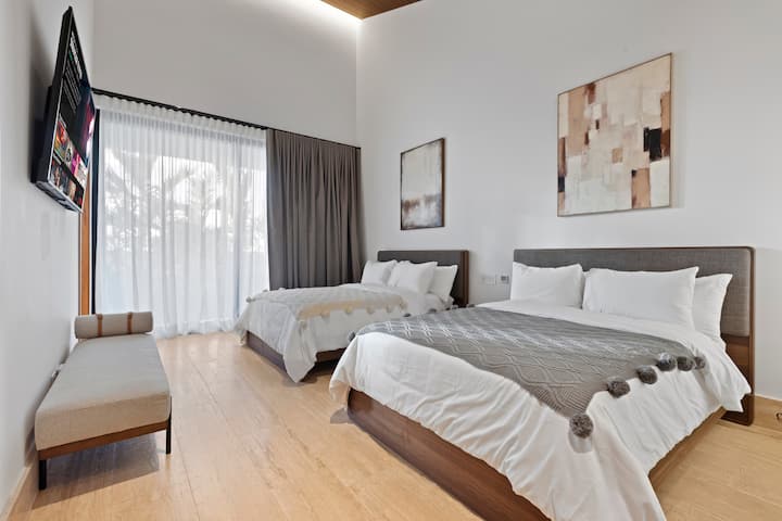 3rd Suite Double Bedroom- Two Double Bed/ Smart TV / Sofa / Walk-in closet / Ensuite Bathroom / Outdoor Space.