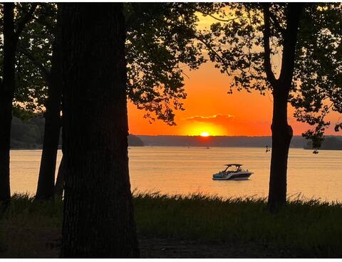 Large lake front home with incredible fall views.