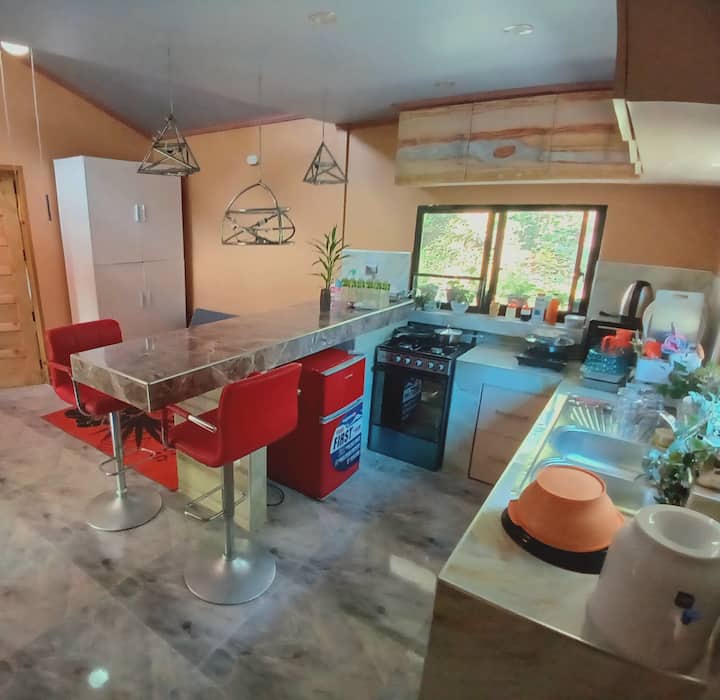 The kitchen in our house Jupiter is fully equipped. 