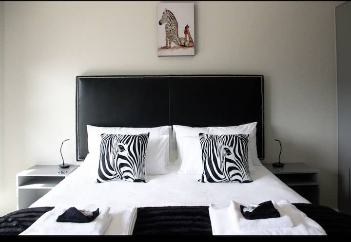 Our Zebra room with comfy King size bed and cosy electric blankets for cooler evenings.