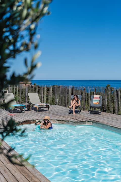 Popular Airbnb listing: Mare è Machja•Heated pool • Sea view • 14 people in Sari Solenzara