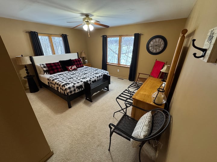 This primary bedroom can accommodate up to two guests with a KING sized bed (New - January 2025)! Amazing lake views from this bedroom also!