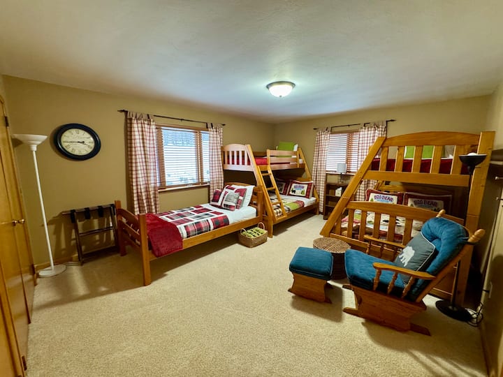 Largest bedroom in the home! Two twin over full bunk beds can sleep up to 6 guests. An additional twin sized bed offers room for one more guest in this room. With all of these beds, there is still plenty of room for luggage and personal items!