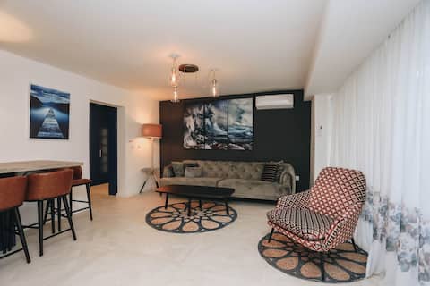 A spacious apartment by the sea.